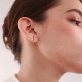 Close up Sleek Radiance Platinum Plated Stud Earrings – Elegant Linear Design with Zirconia Accents